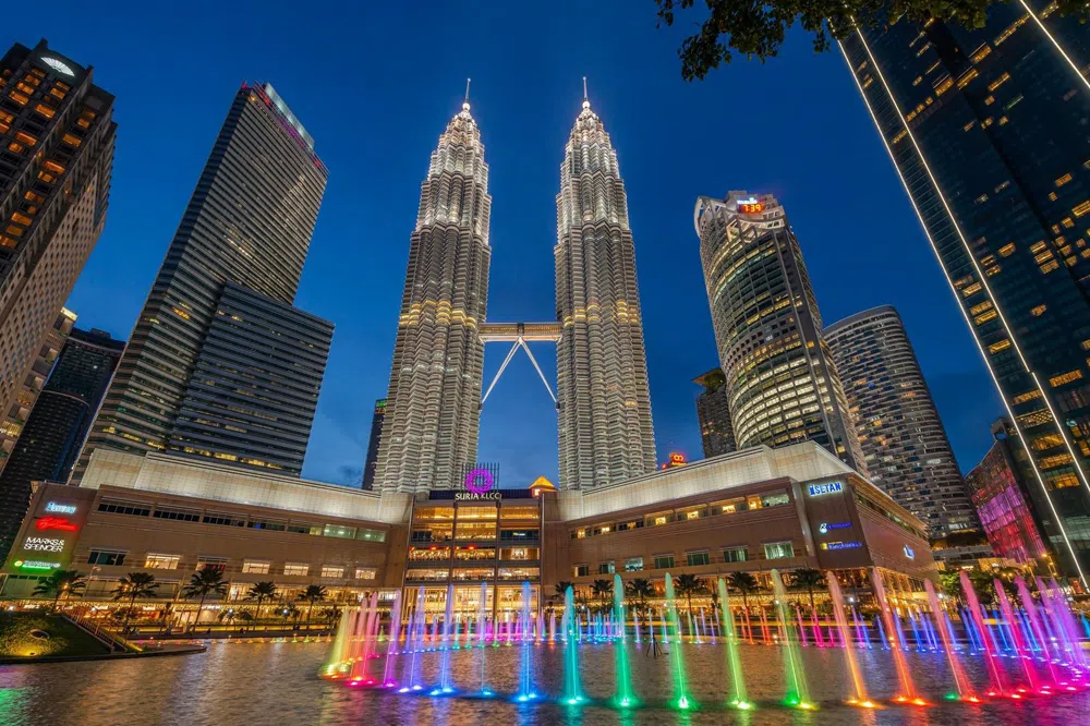 Standing on the Petronas Skybridge in a Kuala Lumpur October